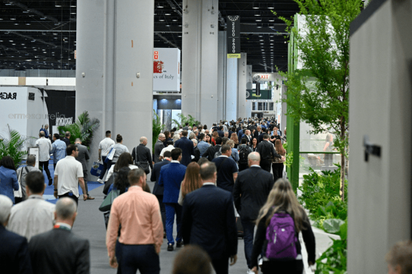 Visitors moving through the Coverings 2025 exhibition